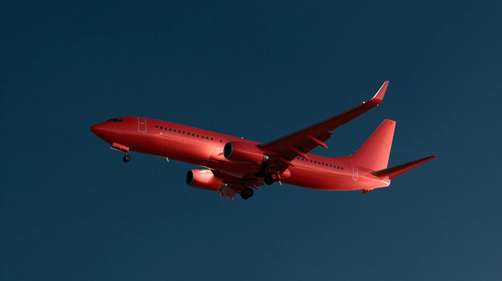 cadmium red airplane , in the darkblue sky , night lighting --preview