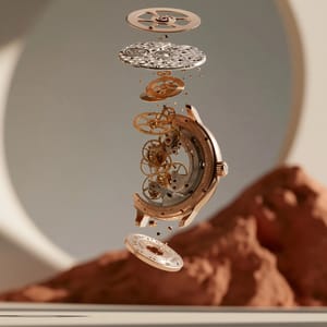 An exploded view of a premium mechanical wristwatch suspended in a minimal gallery, delicate gears and golden metallic parts floating along a clean central axis, soft directional key lighting, muted warm and terracotta tones, low-contrast film-like grade, full-frame macro with shallow depth of field, quiet-luxury commercial photography --ar 4:3 --preview