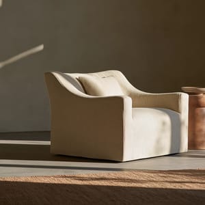 quiet luxury aesthetic, a linen lounge chair in a curated minimal concrete room, soft directional window light, warm sand and terracotta tones, low-contrast film-like grade, faint warm cast, shallow depth of field, natural linen texture, editorial commercial photography --ar 3:2 --style raw --preview