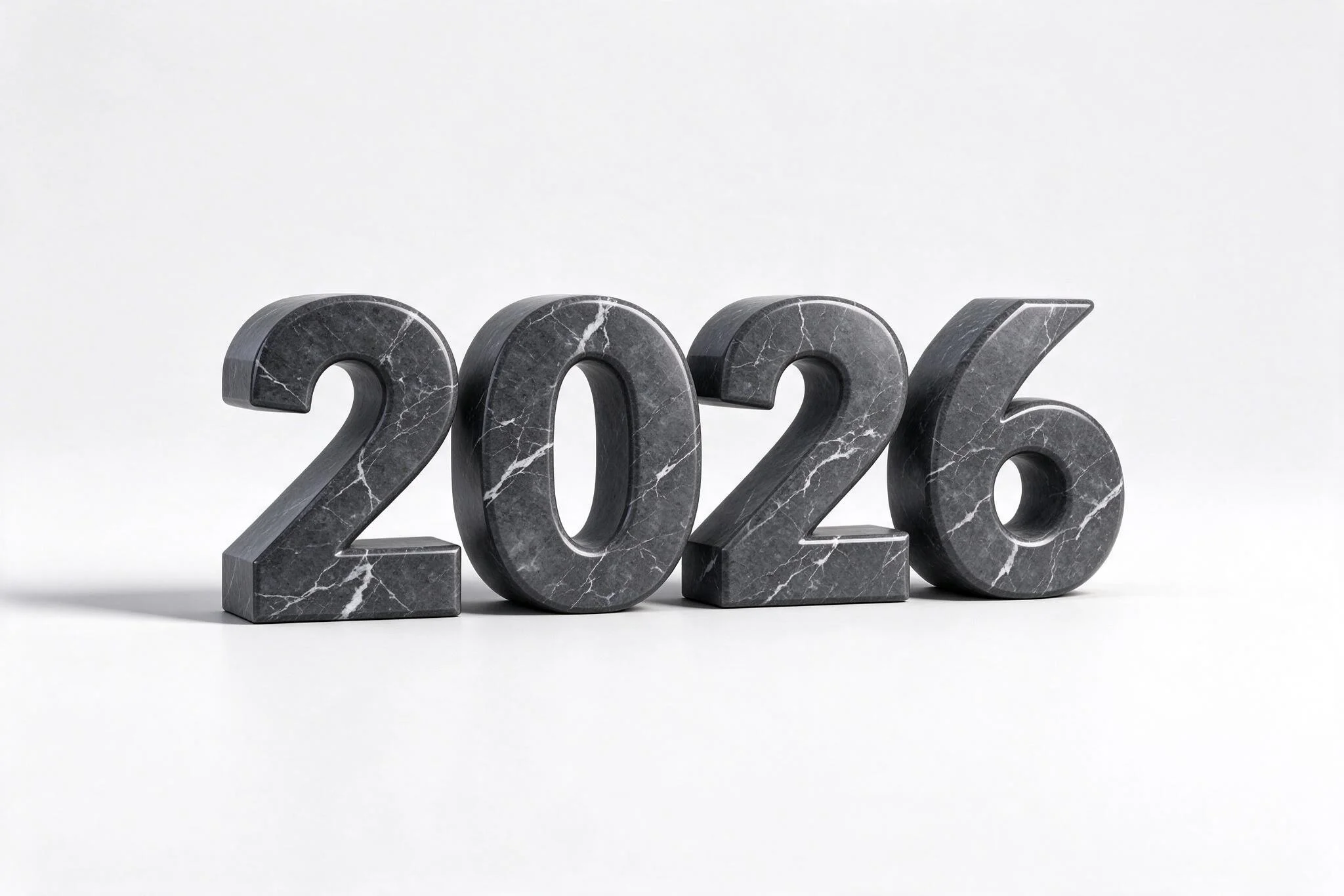 The numerals 2026 made of dark grey marble with white veins stand on a pure white background.