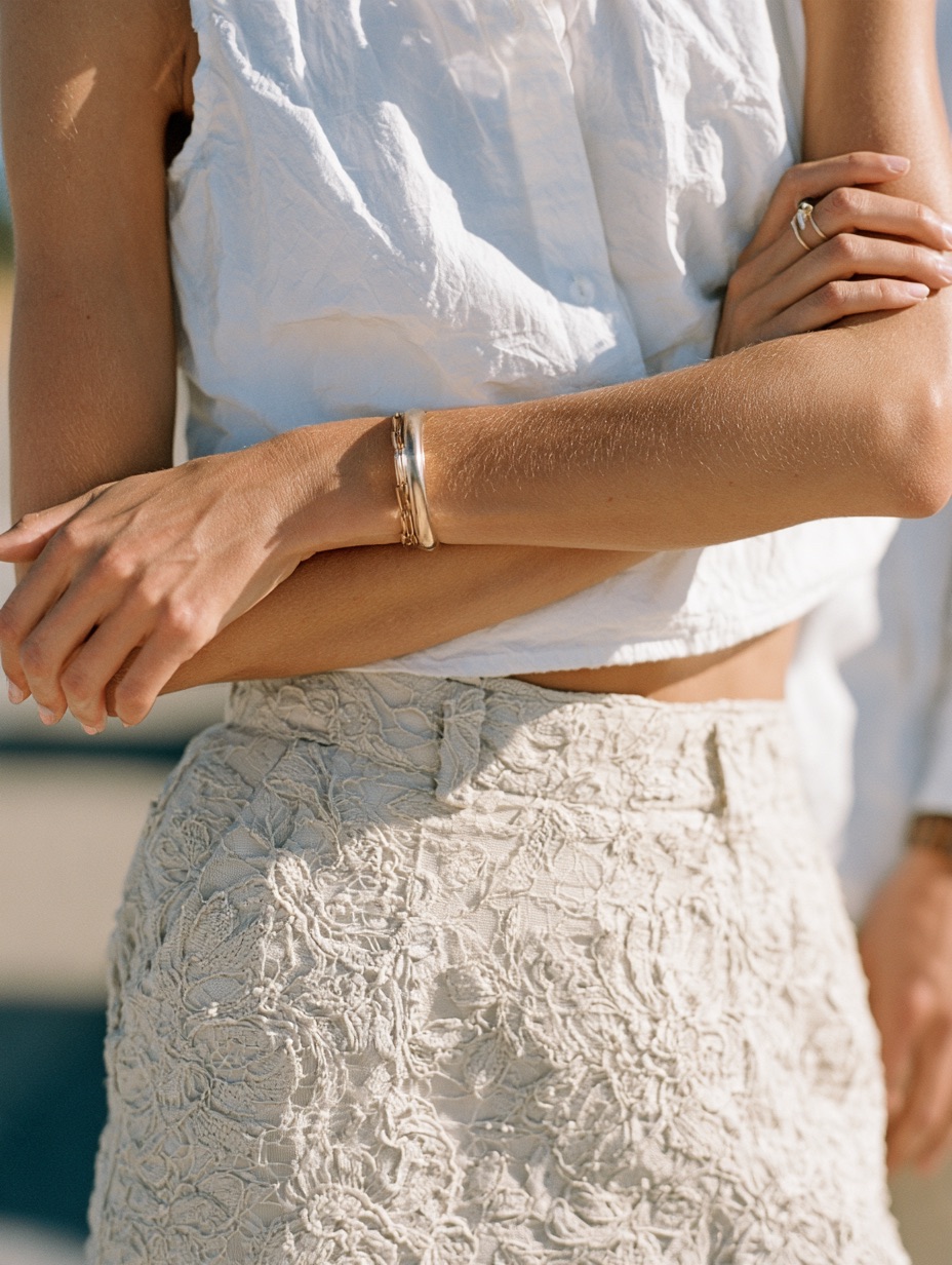 A waist shot of a woman, framed from the waist up.
